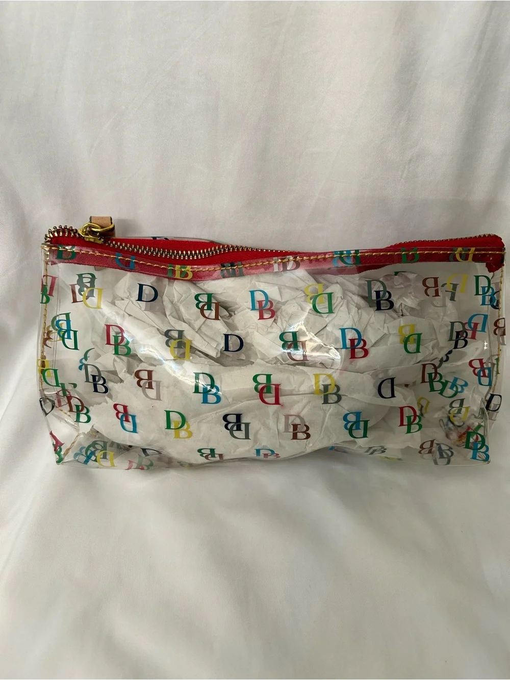Dooney & Bourke Clear Cosmetic Pouch with Multicolor DB Print and Red Trim